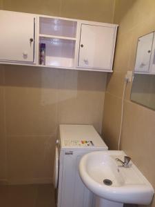 Koupelna v ubytování C O Apartment