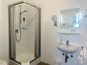 Koupelna v ubytování Hotel-Pension Hommen