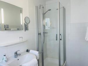 Koupelna v ubytování Hotel-Pension Hommen