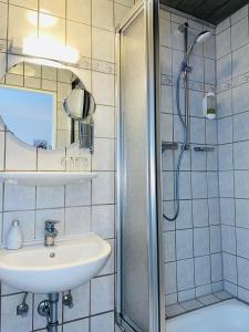 Koupelna v ubytování Hotel-Pension Hommen