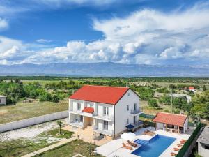 an aerial view of a white house with a red roof at Villa Vera in Benkovac