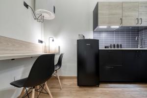 Kuchyň nebo kuchyňský kout v ubytování Design Loft in Centro Storico - Casa Courrier