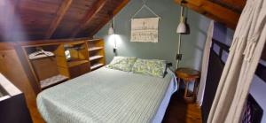 a bedroom with a bed in a room at El viejo garage in Mar de Ajó