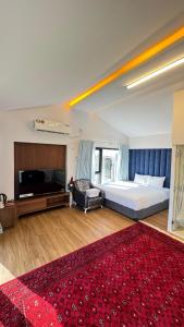 Katil atau katil-katil dalam bilik di Al Asala Resort