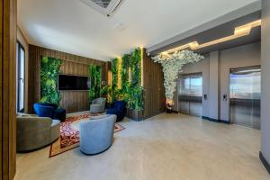 TV a/nebo společenská místnost v ubytování Dedem Hotel Premium - Çorlu