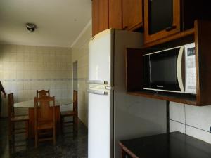 A cozinha ou cozinha compacta de Pousada Central de Cabreuva