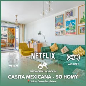 a living room with a green couch and a chair at La Casita Mexicana - Kids Friendly by So Homy- 3 Bed Room - 6 PAX in Saint-Ouen