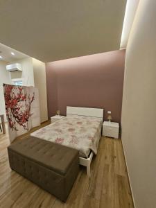 Postel nebo postele na pokoji v ubytování Casa Melograno