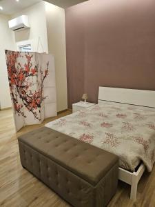 Postel nebo postele na pokoji v ubytování Casa Melograno