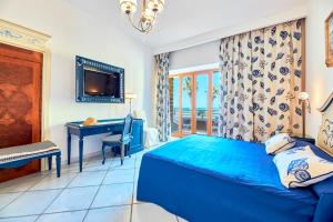 Postel nebo postele na pokoji v ubytování Hotel Villa Sirio