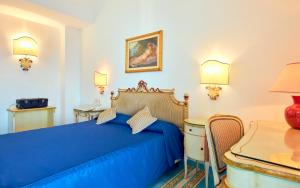 Postel nebo postele na pokoji v ubytování Hotel Villa Sirio
