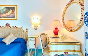 Postel nebo postele na pokoji v ubytování Hotel Villa Sirio