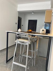 a desk with a chair and a counter top at Sapphire in Nairobi