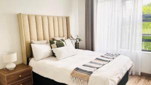 Apartment in Fourways客房内的一张或多张床位