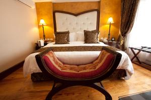 Voodi või voodid majutusasutuse Hotel Celeste Makati toas
