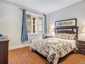 Postel nebo postele na pokoji v ubytování Condo-hôtel Le Champlain - Condo103 Bromont