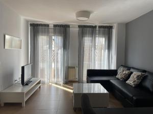 A seating area at Apartamento En El Centro De Ronda