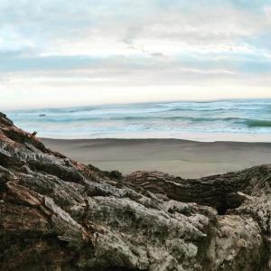 a view of the ocean from a rocky beach at Sleep and Travel in Focene +13 photos