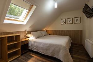 Postel nebo postele na pokoji v ubytování Abriga Bed and Breakfast