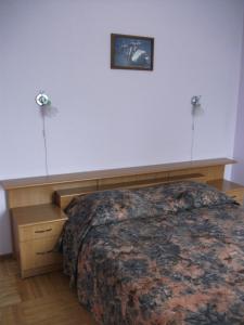 Postel nebo postele na pokoji v ubytování Daugavkrasti Hotel