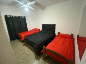 Postel nebo postele na pokoji v ubytování Casa La Paz