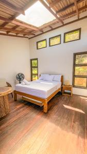 Voodi või voodid majutusasutuse Encanto Hostel toas