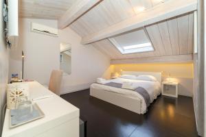 Postel nebo postele na pokoji v ubytování Sciara Biscari B&B + 37 fotografií