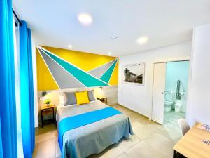 Posteľ alebo postele v izbe v ubytovaní Dori Rooms Hostal
