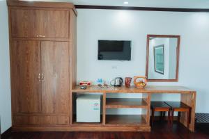 Kuchyň nebo kuchyňský kout v ubytování Vientiane Ruby Riverside Hotel