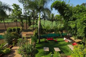 an aerial view of a garden with palm trees at Deepams homestay in Kolhapur