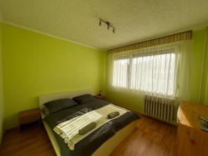 Ένα ή περισσότερα κρεβάτια σε δωμάτιο στο Backstage