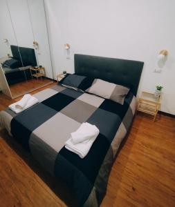 Postel nebo postele na pokoji v ubytování Giulia's Cozy Retreat