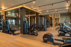 a gym with lots of treadmills and machines at Green Line Villa Sozopol in Sozopol