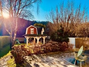 Zahrada ubytování Oboho - Le gîte bohème (Pieds dans l’eau - Lit King Size - Jardin)