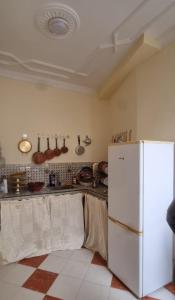 Η κουζίνα ή μικρή κουζίνα στο Appartement du Fleurs +10 φωτογραφίες