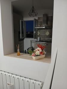 Kuchyň nebo kuchyňský kout v ubytování Molly's Appartment