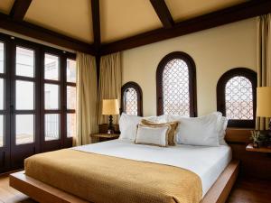 Ein Bett oder Betten in einem Zimmer der Unterkunft Hotel El Pilar Andalucia