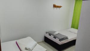 Postel nebo postele na pokoji v ubytování hospedage murillo + 4 fotografie