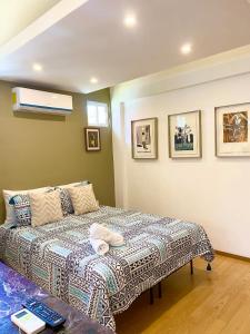 Giường trong phòng chung tại Edgy Vibes Studio in Tijuana
