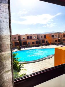 Der Swimmingpool an oder in der Nähe von Bahia Sol Deluxe