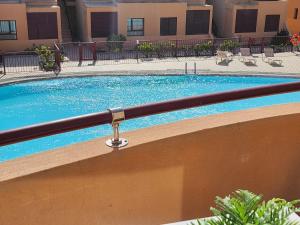 Der Swimmingpool an oder in der Nähe von Bahia Sol Deluxe