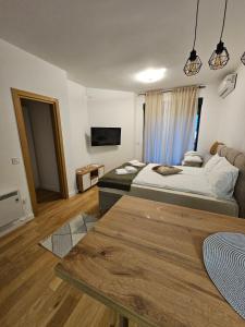 Ένα ή περισσότερα κρεβάτια σε δωμάτιο στο Balkan Square View