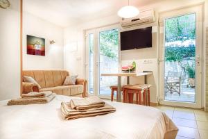 Posteľ alebo postele v izbe v ubytovaní Apartment Ennio