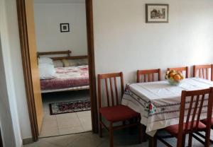 Postel nebo postele na pokoji v ubytování Apartments Niko