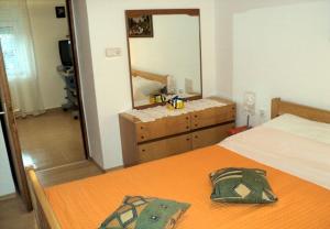 Postel nebo postele na pokoji v ubytování Apartments Niko