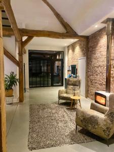 Posezení v ubytování Hoeve De Kleinheide