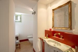 a bathroom with a sink and a mirror at Vigna Luisa Resort - Near Rome in Genzano di Roma +54 photos
