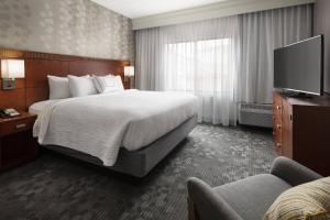 Телевізор і / або розважальний центр в Courtyard by Marriott Boulder