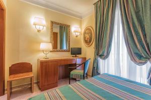 TV a/nebo společenská místnost v ubytování Raeli Hotel Luce