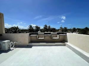 a view of a rooftop of a building at Villa Colibries Chelem in Chelem